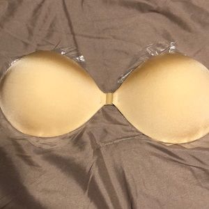 Strapless bra size D but smaller could fit.